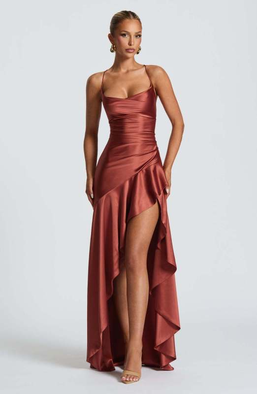 Sexy halter dress with ruffled, irregular hem.